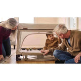 UPPAbaby Remi Travel Crib and Playard, Lifestyle View with Baby (1) - ANB Baby