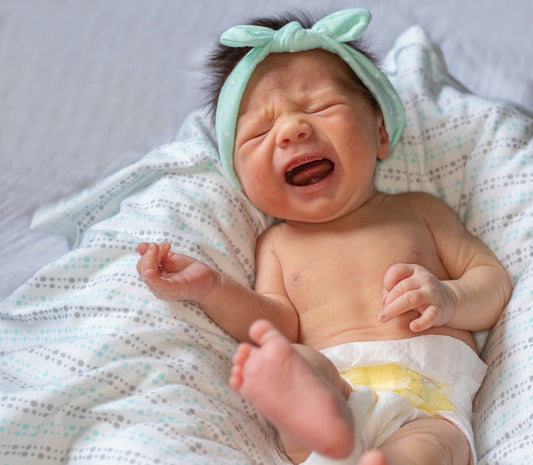 9 Tips for How to Soothe a Baby with Colic - ANB Baby