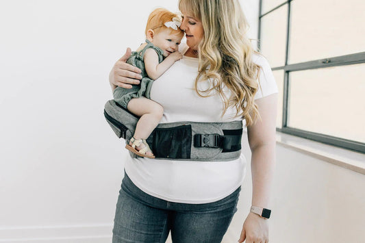 Saving Your Back! Why We Love the TushBaby Hip Carrier - ANB Baby