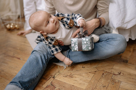 The Pros and Cons of Buying Holiday Gifts for Your Newborn Baby - ANB BABY