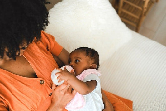 Why Babies Spit Up: What's Normal, What's Not, and 6 Tips to Reduce It - ANB BABY