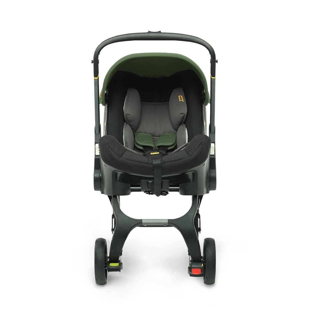green car seat and stroller DOONA Infant Car Seat Stroller With Latch Base
