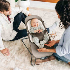UPPAbaby Mira 2-in-1 Bouncer and Seat, Wells, Dark Taupe Mélange, Black Frame, Walnut Wood, Lifestyle 1 - ANB Baby