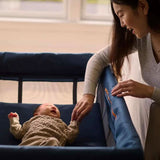 UPPAbaby Remi Travel Crib and Playard, Lifestyle View with Mom - ANB Baby