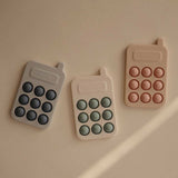 Mushie Phone Press Toy - ANB Baby