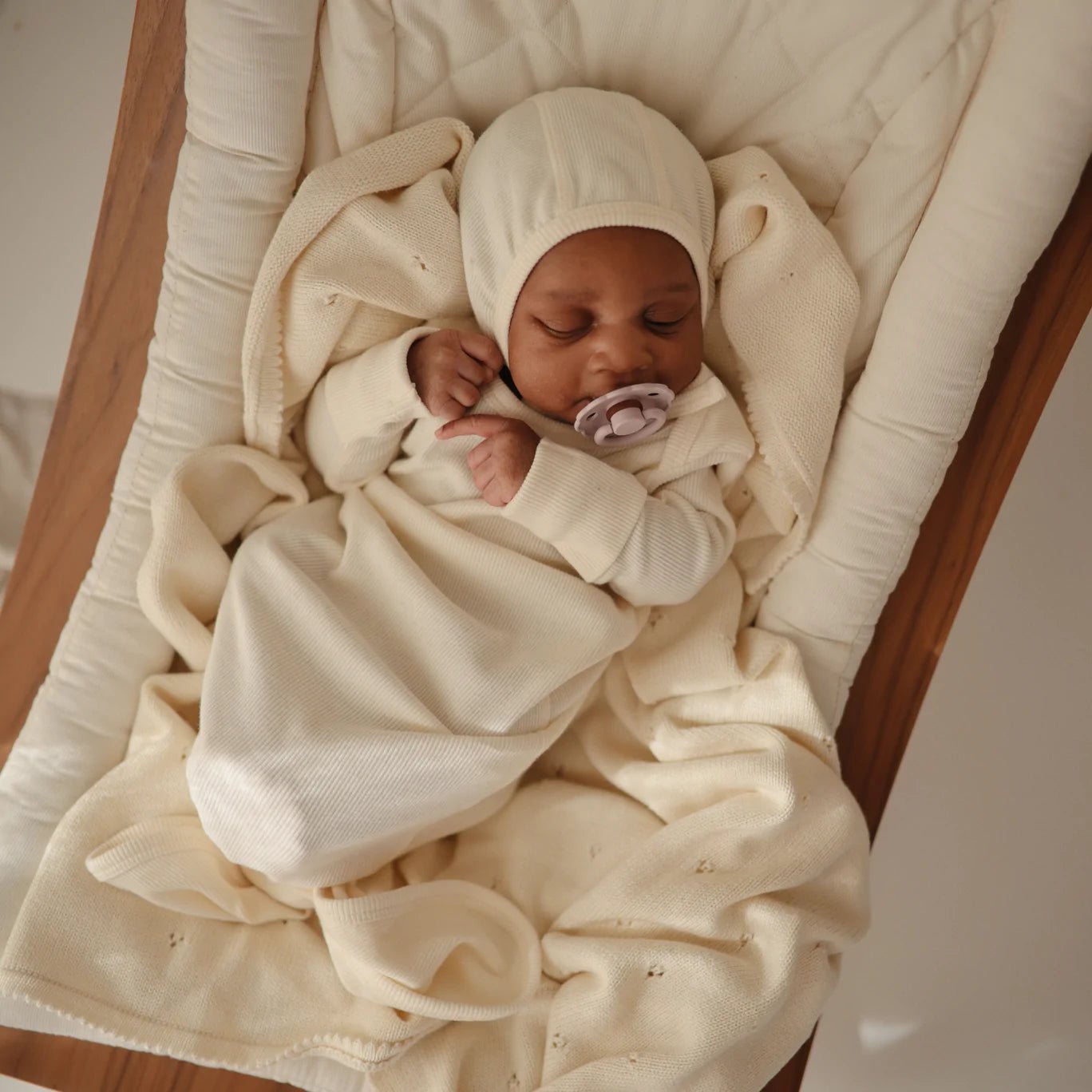 Buy Mushie Ribbed Baby Bonnet -- ANB Baby